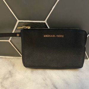 Black and white Michael Kors wristlet